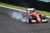 Fernando Alonso (ESP) Ferrari F14 T locks up.