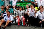 Race winner Nico Rosberg (GER) Mercedes AMG F1 celebrates with the team.