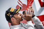 Race winner Lewis Hamilton (GBR) Mercedes AMG F1 celebrates on the podium. Formula One World Championship, Rd9, British Grand Prix, Race Day, Silverstone, England, Sunday, 6 July 2014
