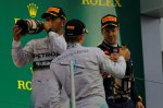 Lewis Hamilton (GBR) Mercedes AMG F1, Nico Rosberg (GER) Mercedes AMG F1 and Sebastian Vettel (GER) Red Bull Racing on the podium with the champagne.