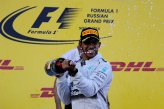 Race winner Lewis Hamilton (GBR) Mercedes AMG F1 sprays champagne on the podium.